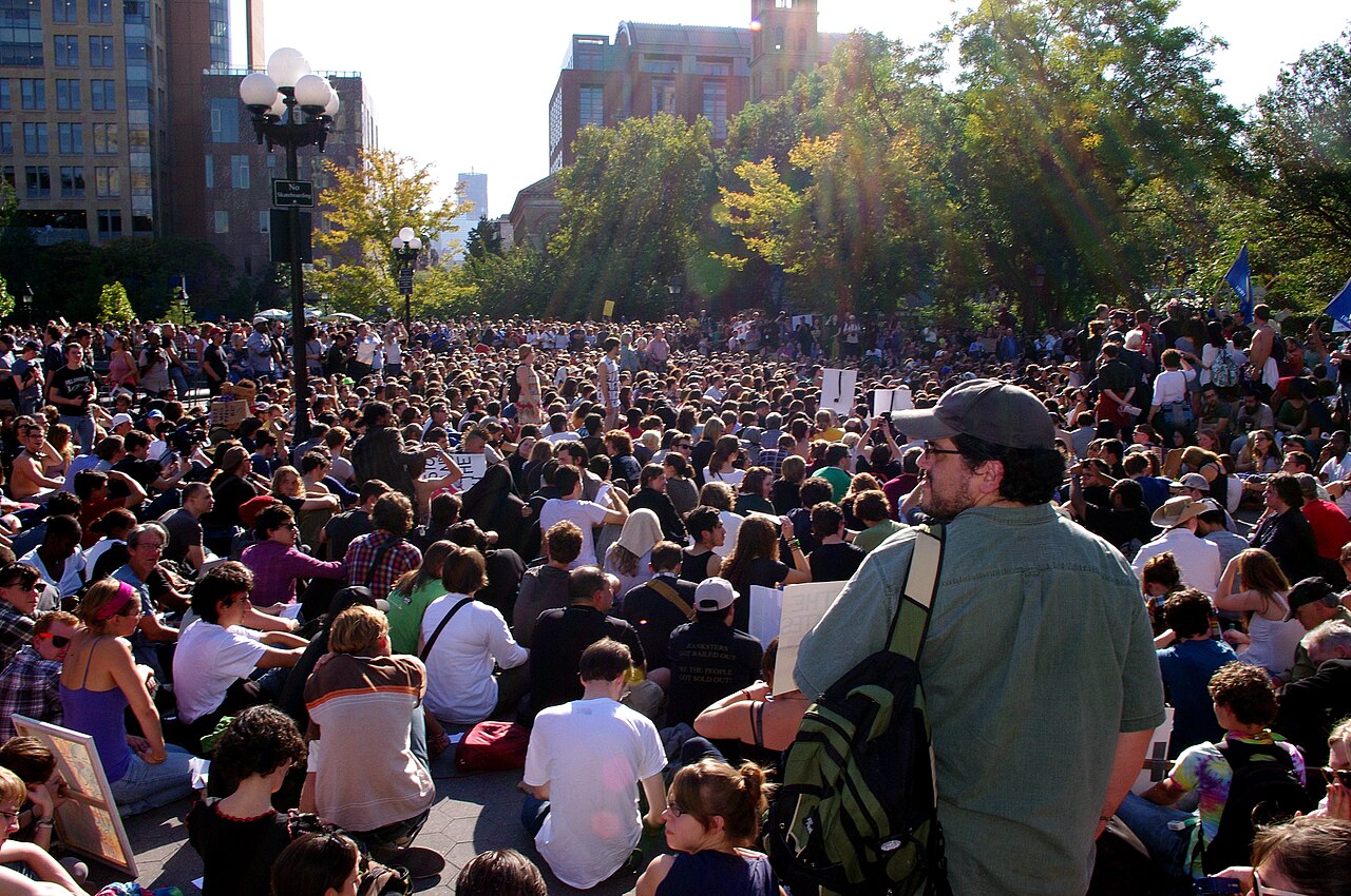 Occupy Wall Street general assembly at Washington Square Park, 2011. Hundreds gathered for direct democratic deliberation.